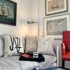 kiss beige cushion made of 100% cotton, with wonderful print design of women's body with red heart on a modern sofa.