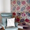 nipple white cotton square cushion made of 100% cotton, with printed outline female body and chest in a modern leather armchair.
