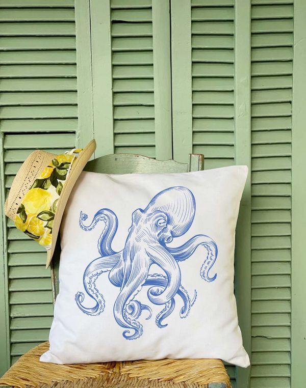 antonio White cushion made of 100% cotton, and blue octopus design decorates the exterior of a summer house.